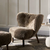 Armchairs & Pouffes